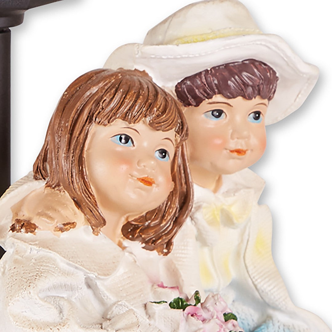 Couple With Solar Street Light Statue