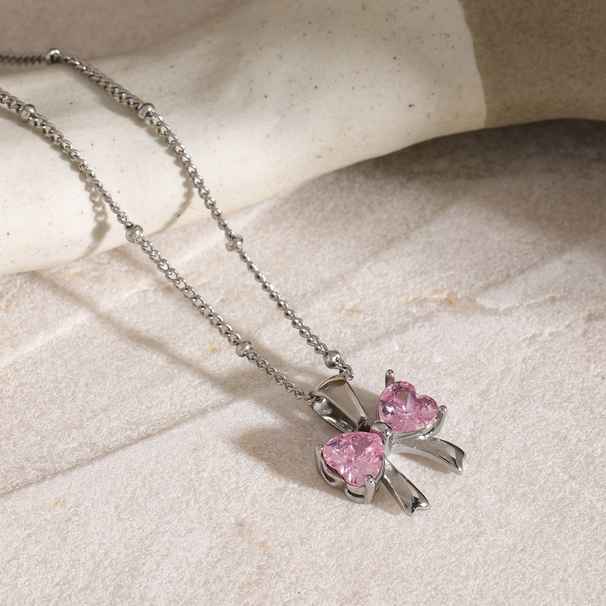 Stainless Steel Inlaid Zircon Bow Necklace