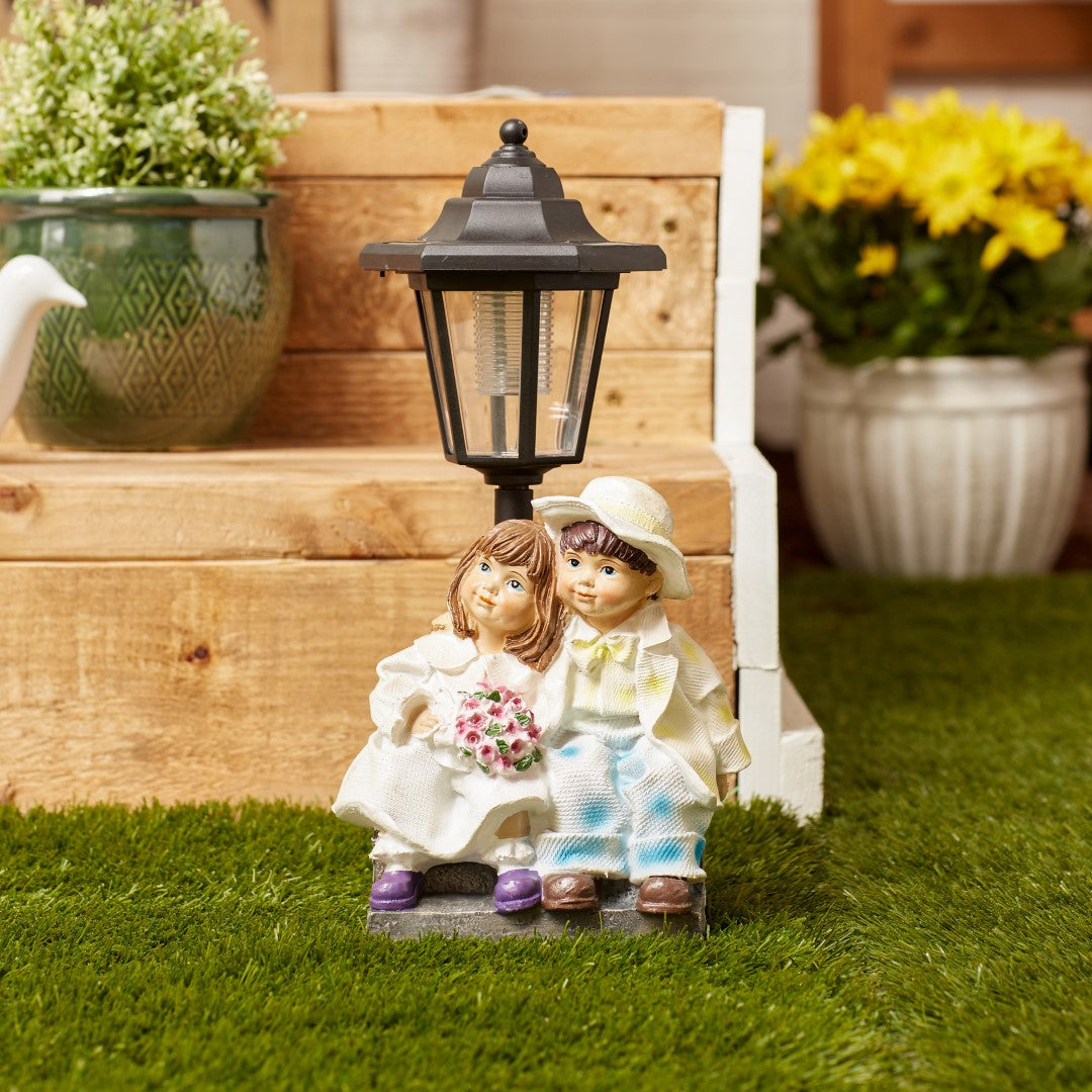 Couple With Solar Street Light Statue 