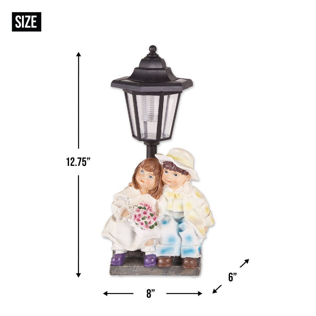 Couple With Solar Street Light Statue 